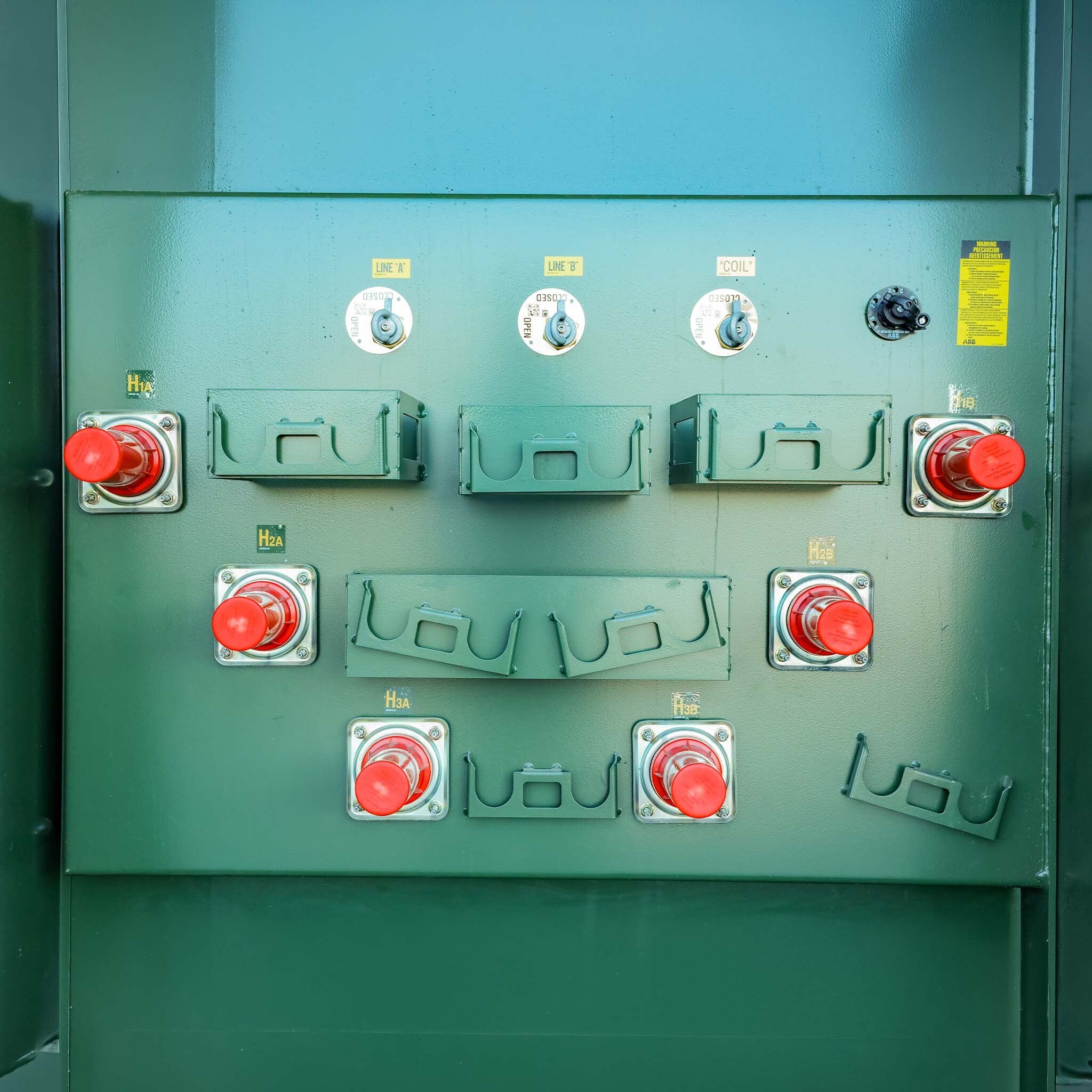 Primary bushings on a 2550 kVA Maddox padmount transformer
