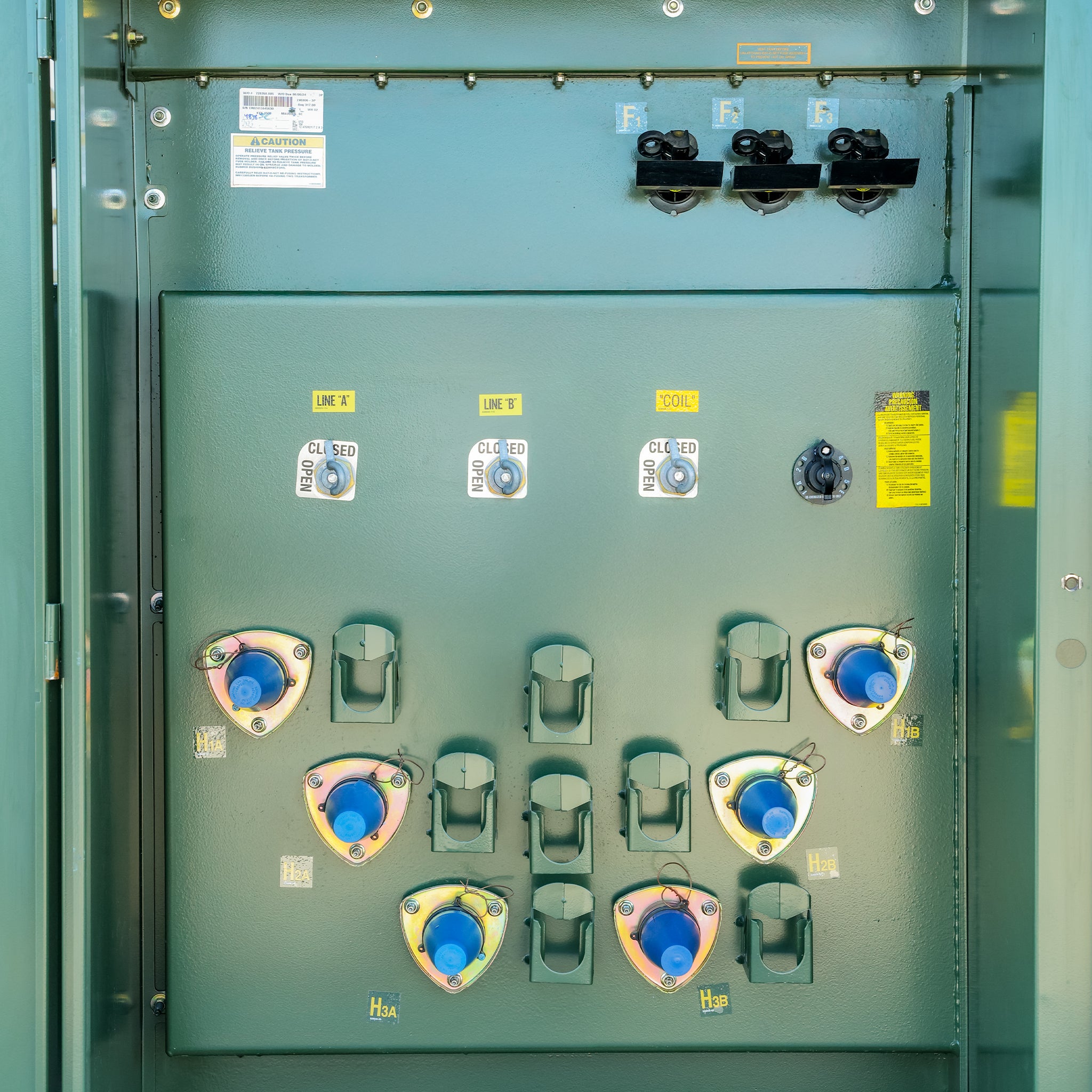 Primary bushings on a 2000 kVA Maddox padmount transformer